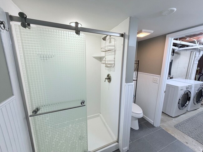 Building Photo - Spacious 4-Bedroom Home with Pond Views & EV-Ready Garage – Bloomington!!