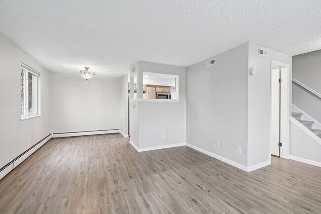 Building Photo - Townhome-Style Living with Greenbelt Views, Attached Garage & Community Pool!