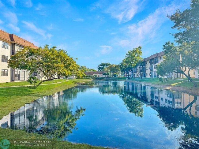 Building Photo - 6090 N Sabal Palm Blvd