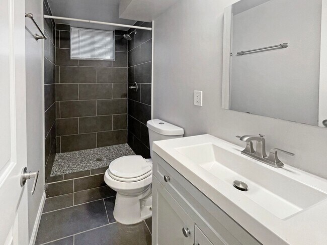 Building Photo - 2 BED, 1 BATH GARDEN LEVEL CONDO NEAR SLOA...