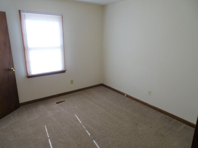 Building Photo - Great location, large wooded and fenced ya...