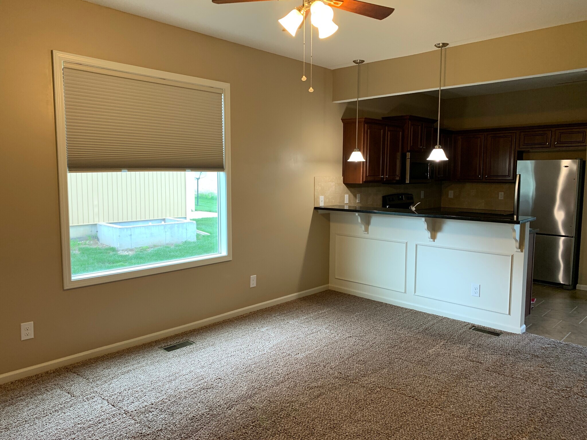 Living Room/Breakfast Bar - 1631 N 127th St