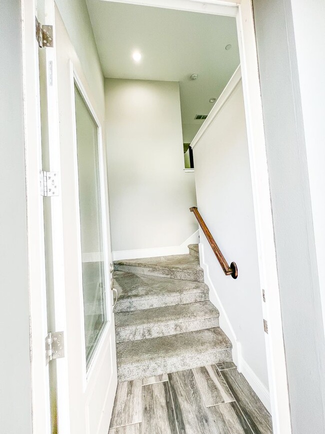Building Photo - Luxury 4-Bedroom Townhome in Laureate Park – Now Available!