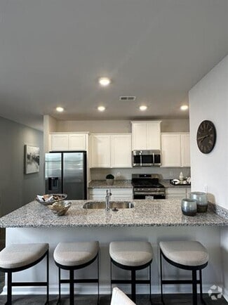 Building Photo - New 4/2.5 Townhome Near Lake Conestee and ...