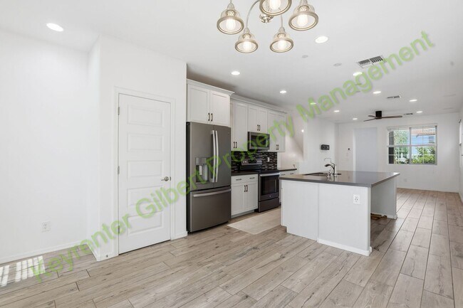 Building Photo - Modern Gilbert Lakeview Townhome in The La...