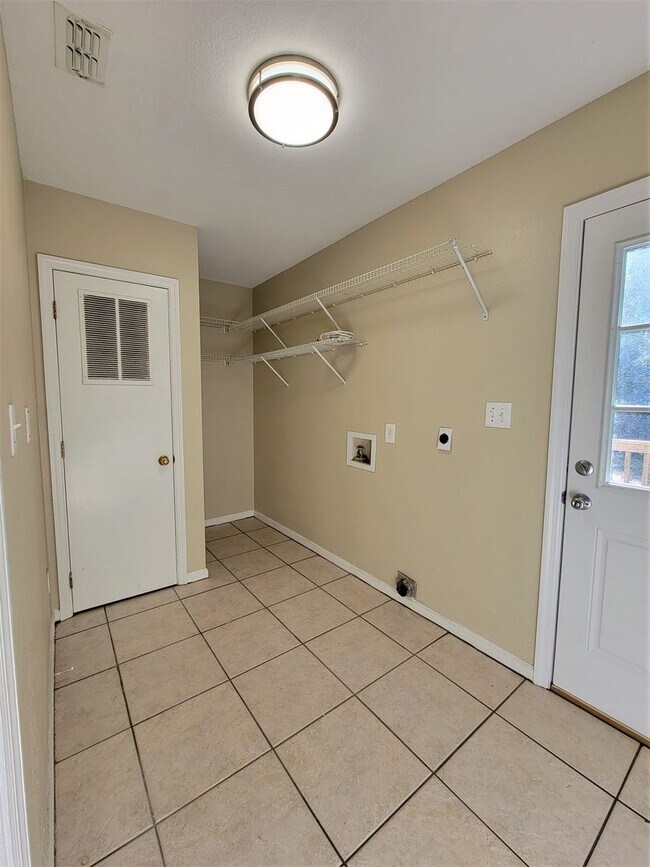 Building Photo - 2 bedroom duplex for rent right away off E Mahan, wood floors and fireplace for $1450 per month