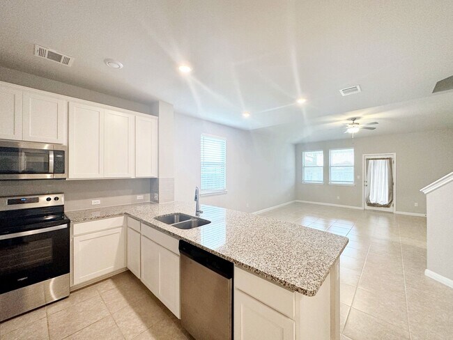 Building Photo - Bright & Roomy 5 Bedroom, 2.5 Bathroom Home with 2-Car Garage