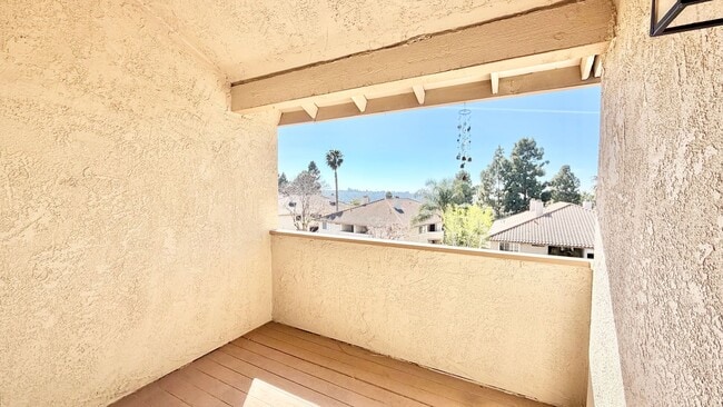Building Photo - Beautifully Remodeled and Updated Upstairs Condo Unit in the Private & Gated Vista Way Village Co...