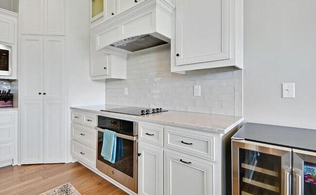 Building Photo - 4 BR/3BA | Newly Renovated Single Family Home | 3-Car Covered Parking | Back Deck