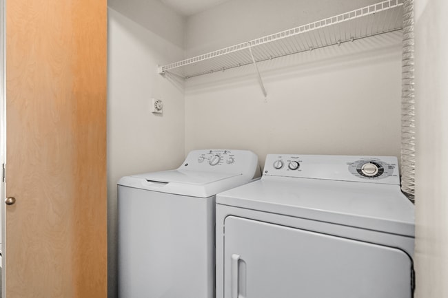 Enjoy the convenience of having your own washer and dryer at home. - Villas at Lawrence