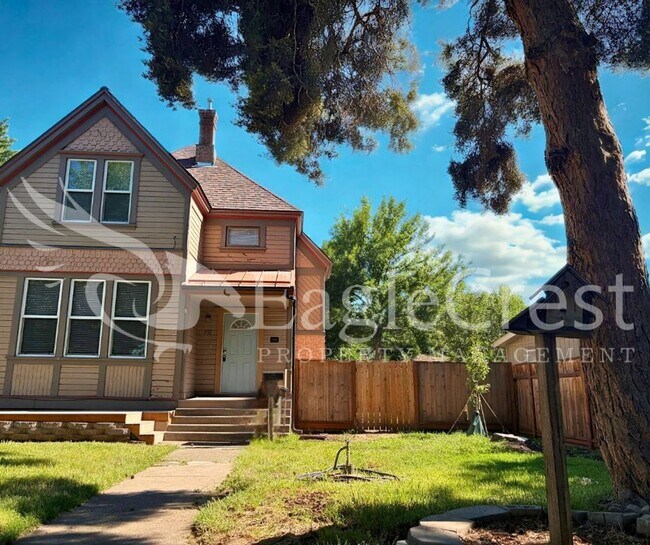 Building Photo - Charming Historic 4-Bedroom Home with Fenced Yard & Chicken Coop