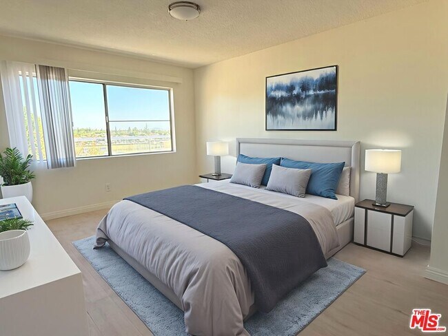 Building Photo - 10200 De Soto Ave