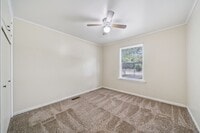 Building Photo - Cute Duplex Corner Lot Fenced Yard