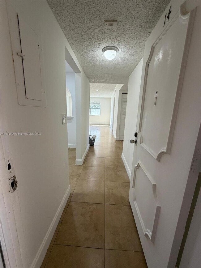 Building Photo - 10701 Royal Palm Blvd