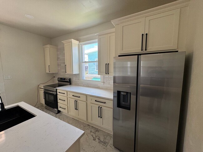 Building Photo - Updated 3-Bedroom, 2-Bath with all new appliances.