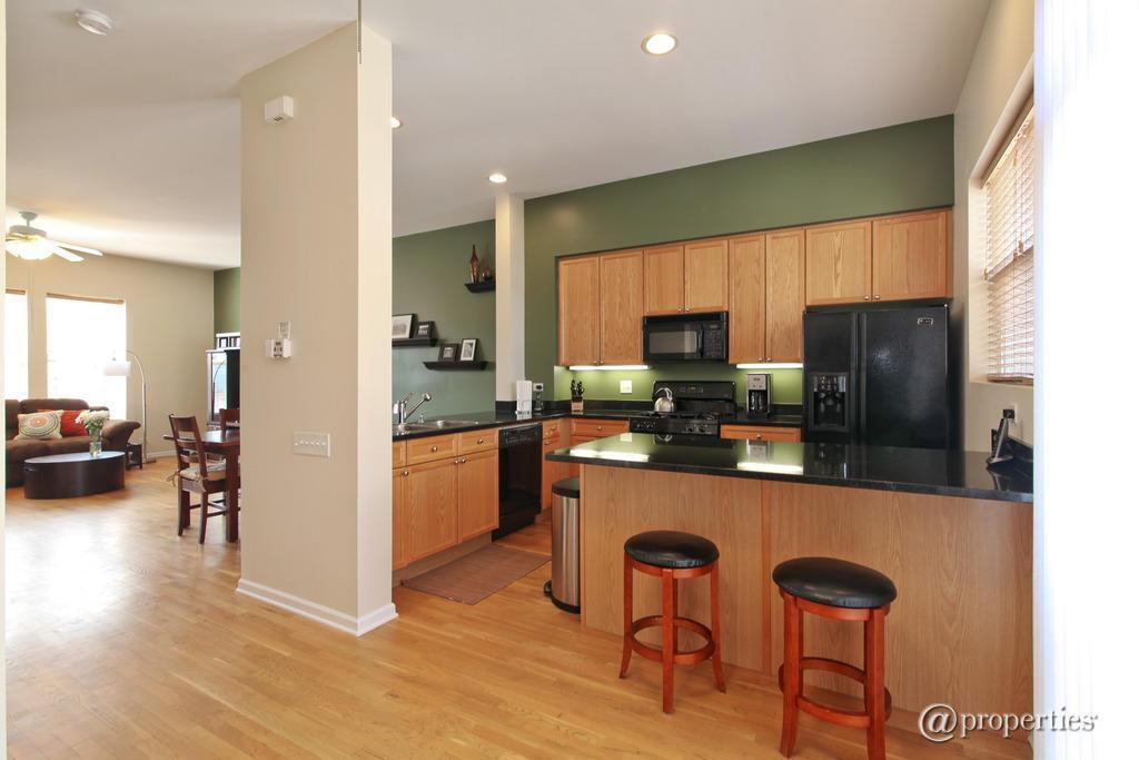 Spacious Kitchen with Bar - 7307 Franklin Street