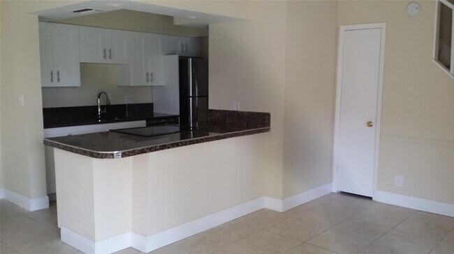 Building Photo - 8877 NW 28th Dr