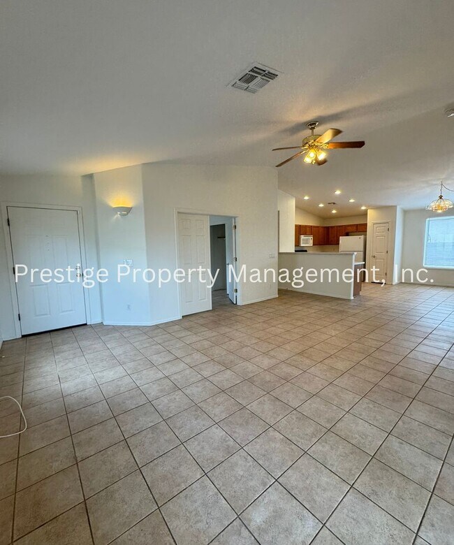Building Photo - Charming All Tile 4/2 Rita Ranch Home