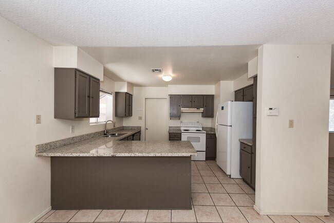 Building Photo - 4598 W 18th Ln