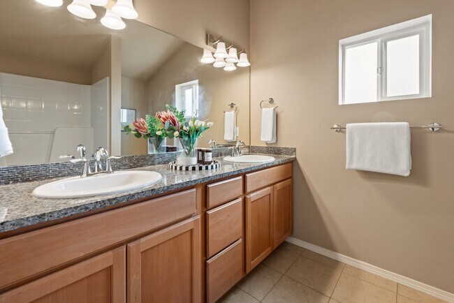 Building Photo - 4BR + Den Greenwood Home with Private Suite & 2-Car Garage
