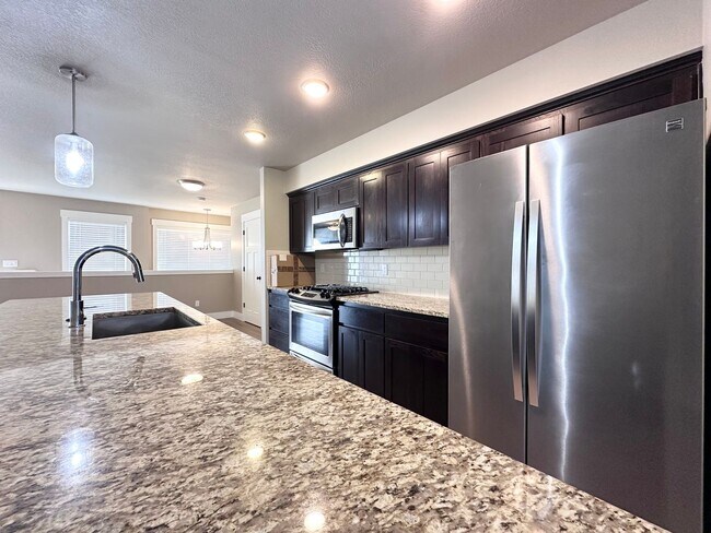 Building Photo - LUXURY TOWNHOUSE; 2 CAR GARAGE, BONUS ROOM...