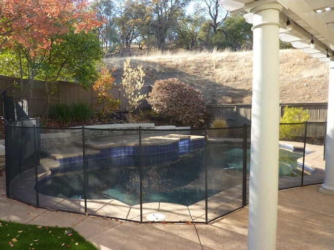 Building Photo - Stunning Single-Family House with a Backyard Oasis in a exclusive Gated Community of Serrano