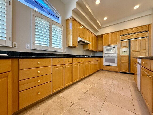 Building Photo - Grand 3 bedroom home with lake and golf course views located in Resort Villas ready to be your pa...