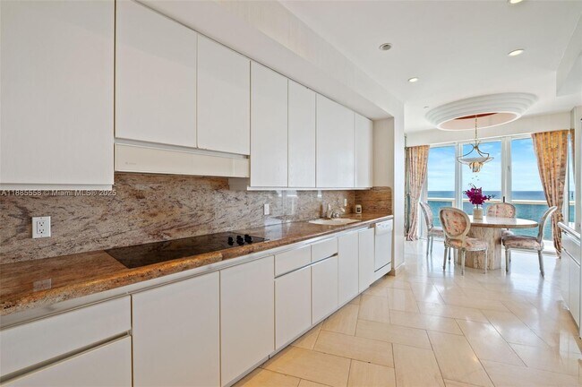 Building Photo - 9601 Collins Ave