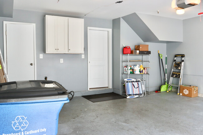 Garage with fresh paint and concrete floor coating - 12132 Grey Squirrel St