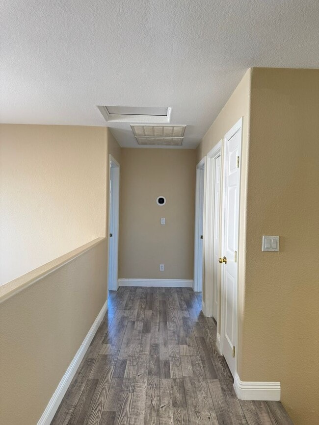 Building Photo - **Beautiful 4-Bedroom Home with Open Floor Plan, Solar, EV Charger & NO HOA**