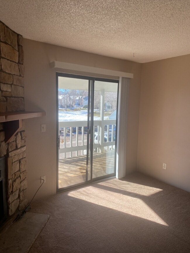 Building Photo - "Charming 1-Bedroom Condo with Cozy Fireplace and Garage in Prime Denver Location!"  Available Now!