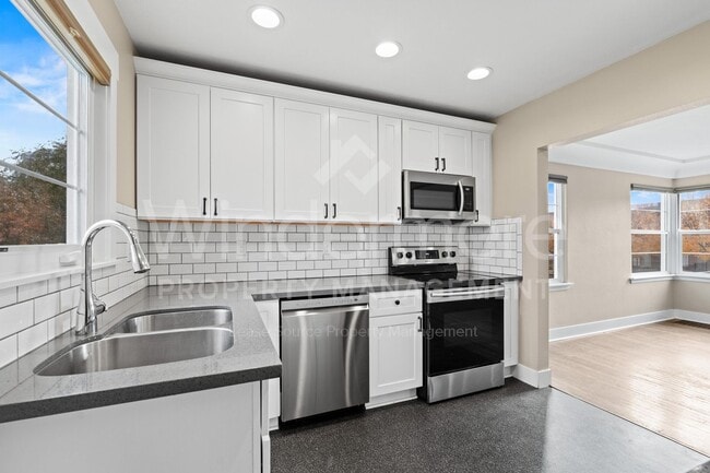 Building Photo - Bright, Charming Home with Modern Features and Exceptional Indoor–Outdoor Space Kendall Yards