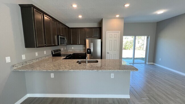 Building Photo - Spacious 3BD/2BA Palm Bay Home – Modern Comfort & Great Location!