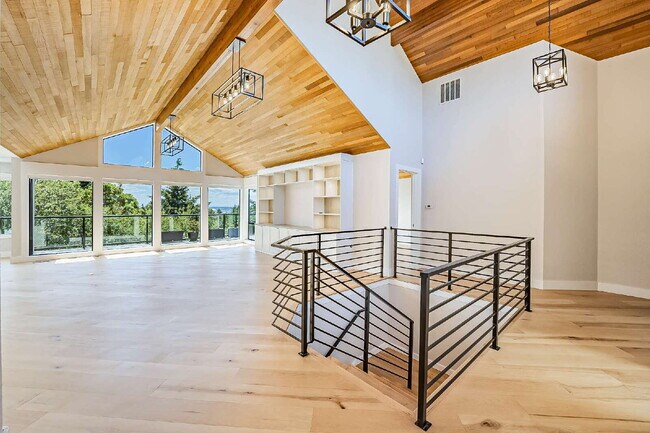 Building Photo - Sophisticated and Elegant home is located in Harbor Ridge at Browns Point. Spacious 4 bedroom, 4 ...