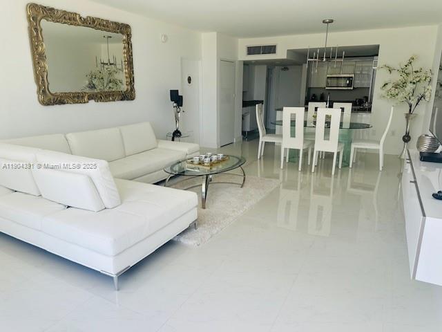 Building Photo - 10275 Collins Ave