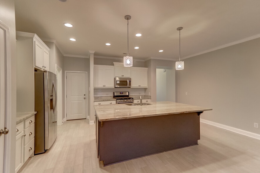Kitchen w/ Garage door on left - 2069 Kings Gate Ln