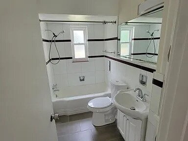 Building Photo - Beautiful Mid-Century home completely updated with two first-floor bedrooms, a spacious second-fl...