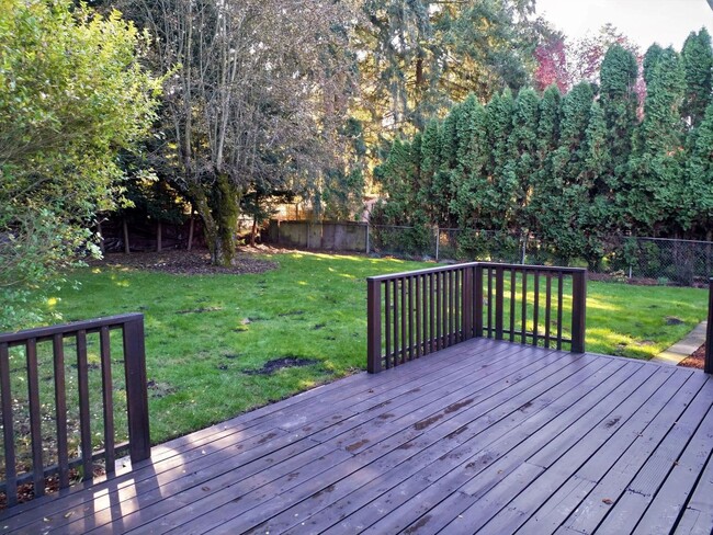 Building Photo - Charming updated 3 bed 1 bath ranch style home with double car garage and large fenced back yard.