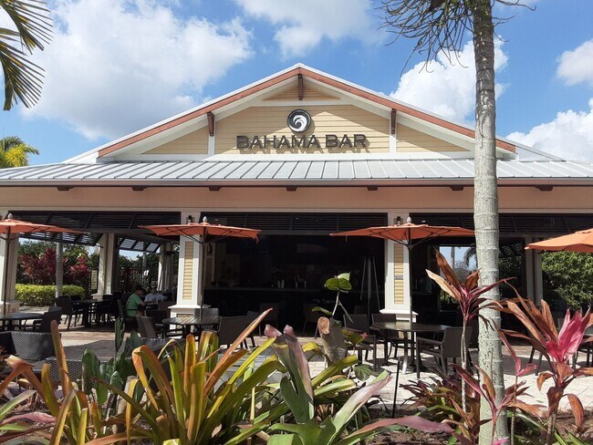 Building Photo - Seasonal/short term turnkey furnished Incredible 2/2 with den ground floor condo in resort Esplan...