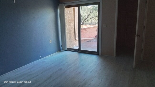 Building Photo - Unfurnished end unit townhome  55 and older community