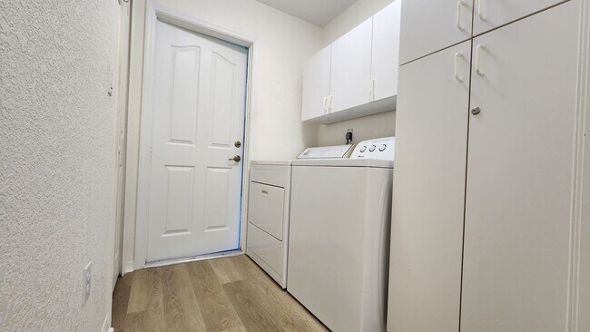 Building Photo - Fresh Paint, New Floors, and a Heated Pool - Move-In Ready!