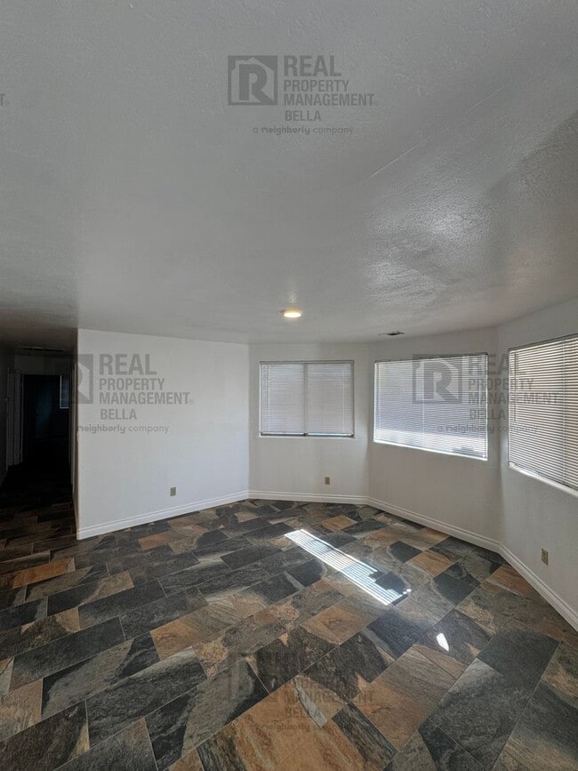 Building Photo - Peaceful Nuevo Living with Gated Driveway, Spacious Layout and Outdoor Living