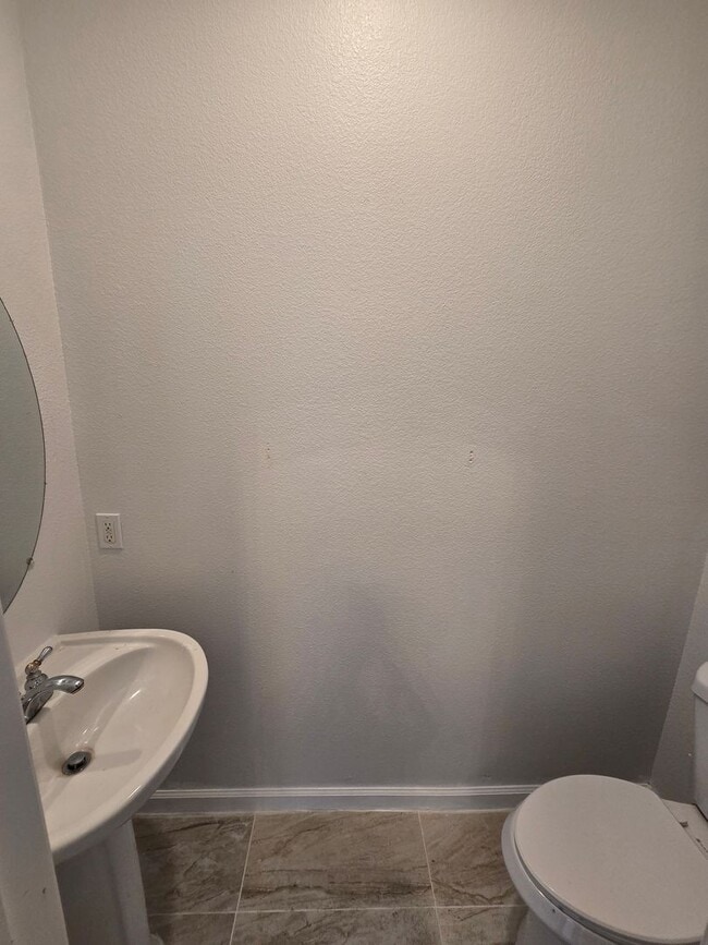 Building Photo - Beautifully Remodeled Tri Story Home located in a Gated Community ...