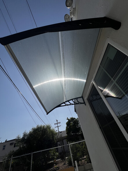 Solar reflector to prevent heat from entering home - 5614 Riverton Ave