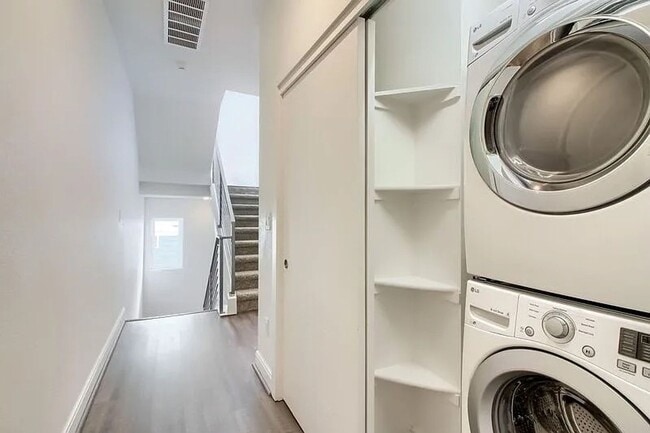 Building Photo - Modern LoHi Living with Rooftop Deck & City Views!!