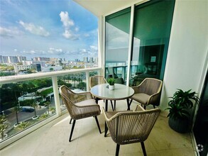 Building Photo - 18201 Collins Ave
