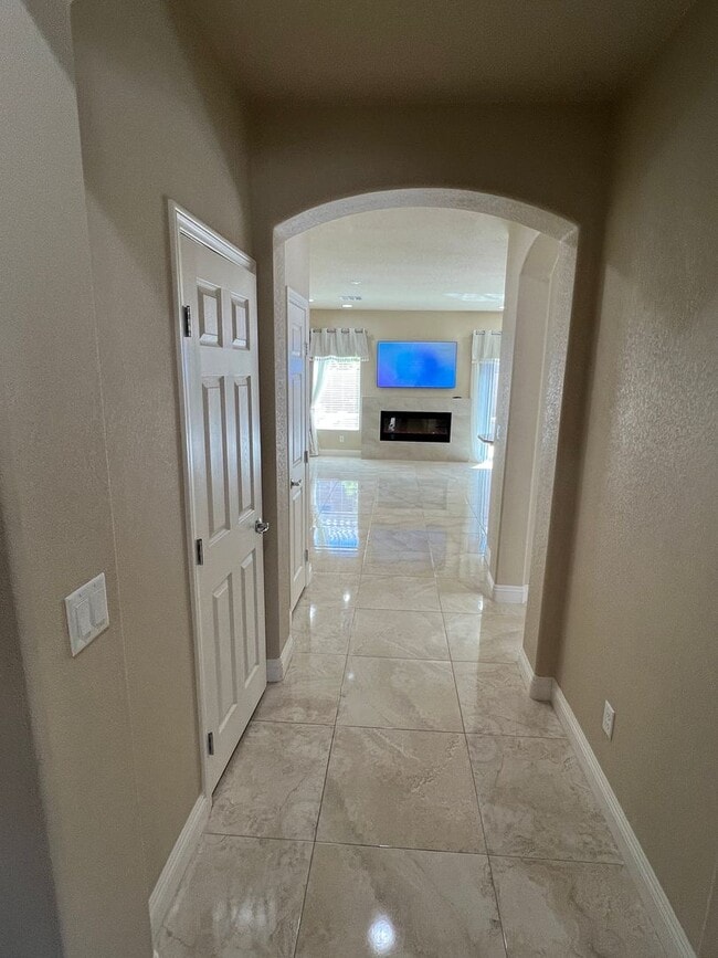 Building Photo - A Fantastic 4 Bedroom Home with the primary Downstairs, in Silverado Ranch