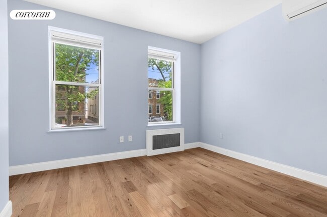 Building Photo - 61-04 Grove St