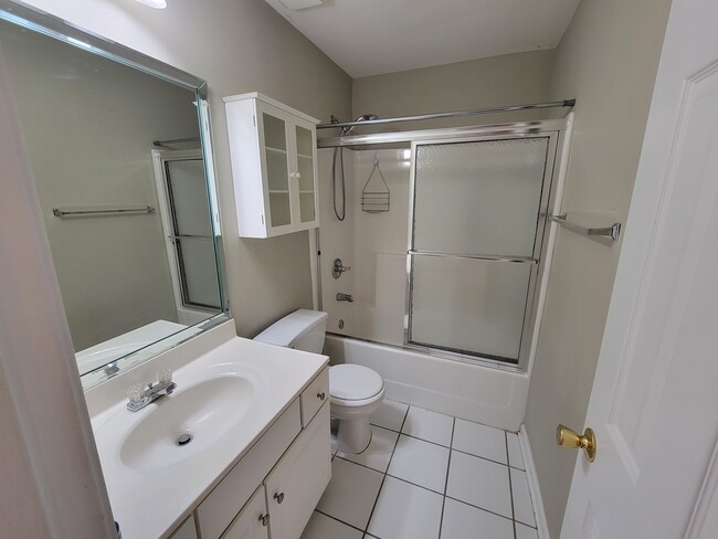 Private bathroom in the primary bedroom - 205 Woodstone Dr