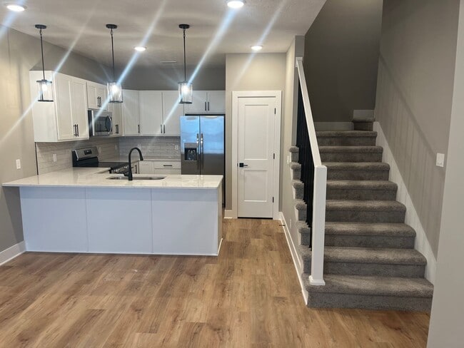 Building Photo - New Construction, 2 bed, 3 bath Row Home, with 2 car garage, fireplace, and rooftop deck!